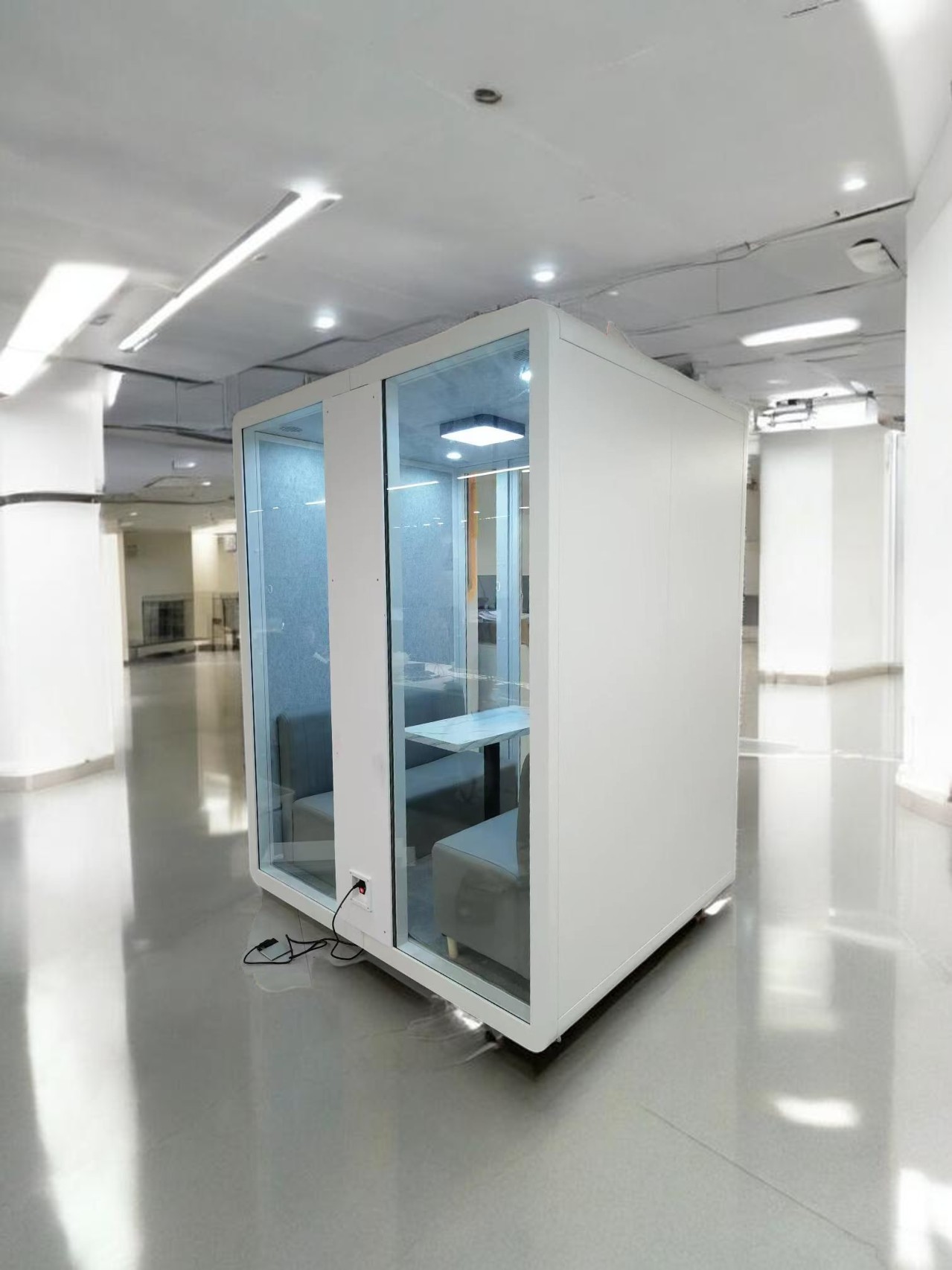 Ouvertu Meeting Pod exterior in an open office space